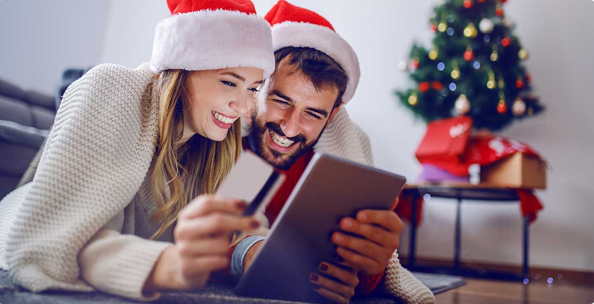 Couple doing Christmas shopping online
